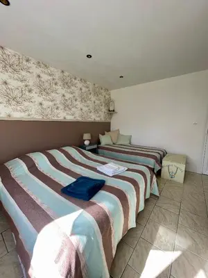 Un ou plusieurs lits dans un hébergement de l'établissement Chambres d'Hôtes Lefoulon