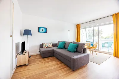 Télévision ou salle de divertissement dans l'établissement La Tortue Joyeuse - Appartement avec Loggia