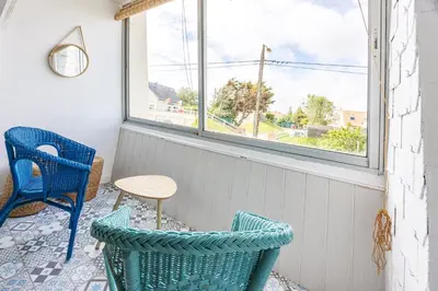 Coin salon dans l'établissement La Tortue Joyeuse - Appartement avec Loggia