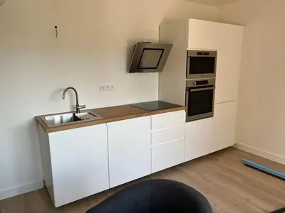 Cuisine ou kitchenette dans l'établissement Appartement tout confort
