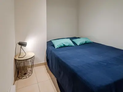Un ou plusieurs lits dans un hébergement de l'établissement Studio La Presqu'île-19 by Interhome