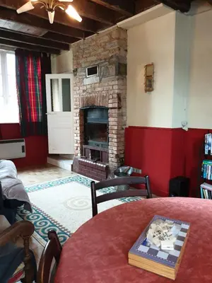 Coin salon dans l'établissement Saint Cyr du Bailleul - Maison