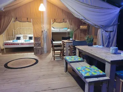 Un ou plusieurs lits dans un hébergement de l'établissement Tente Lodge Safari