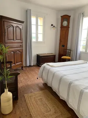 Un ou plusieurs lits dans un hébergement de l'établissement La Maison Bleue