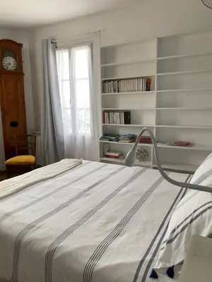 Un ou plusieurs lits dans un hébergement de l'établissement La Maison Bleue