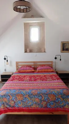 Un ou plusieurs lits dans un hébergement de l'établissement Maris Domus près des plages du débarquement