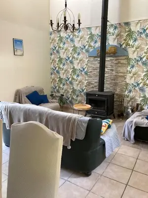 Coin salon dans l'établissement GITE EQUESTRE DE LA LANDE