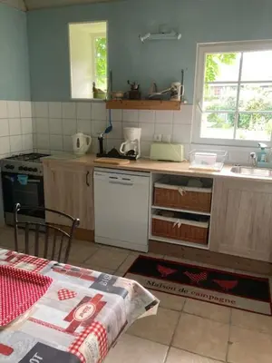 Cuisine ou kitchenette dans l'établissement GITE EQUESTRE DE LA LANDE