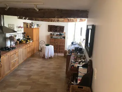 Cuisine ou kitchenette dans l'établissement Magnifique longère du Cotentin