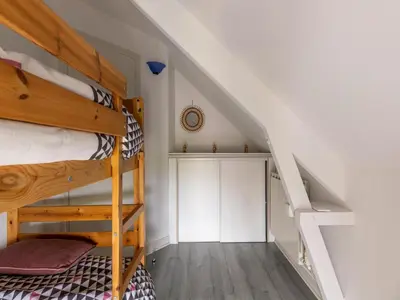Un ou plusieurs lits dans un hébergement de l'établissement Sunlit Garden Escape Normandy
