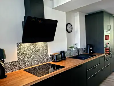 Cuisine ou kitchenette dans l'établissement Appartement Cosy Caen