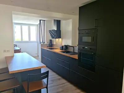 Cuisine ou kitchenette dans l'établissement Appartement Cosy Caen