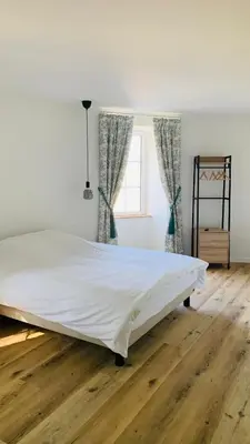 Un ou plusieurs lits dans un hébergement de l'établissement Chambres Vaugoubert