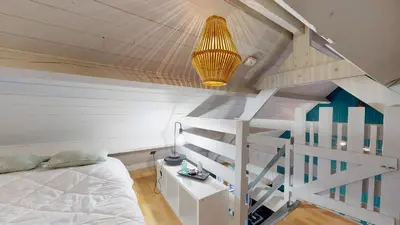 Un ou plusieurs lits dans un hébergement de l'établissement Le chalet Normand