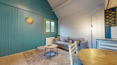 Coin salon dans l'établissement Le chalet Normand