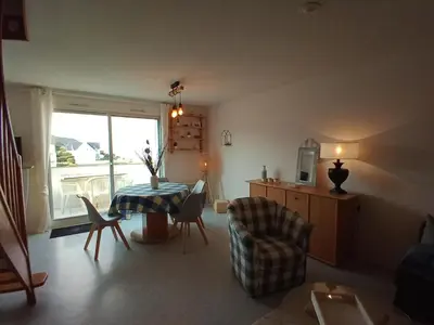 Coin salon dans l'établissement DUPLEX les pieds dans l' eau