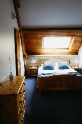 Un ou plusieurs lits dans un hébergement de l'établissement Moulin MORIN