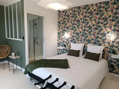 Un ou plusieurs lits dans un hébergement de l'établissement Maison Bailly