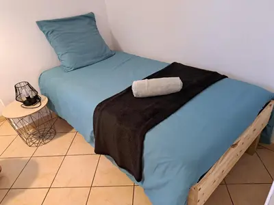 Un ou plusieurs lits dans un hébergement de l'établissement Cottage Le Canari 3 étoiles, à 5 minutes du Mont St-Michel