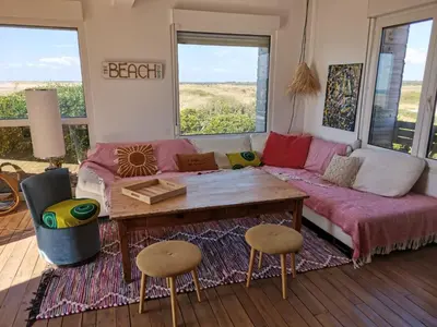 Coin salon dans l'établissement La maison sur la plage