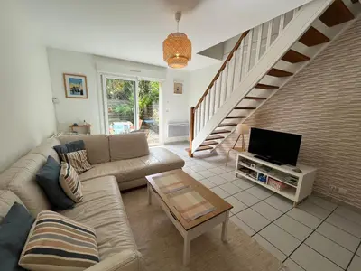 Coin salon dans l'établissement Maison calme avec terrasse - Calypso