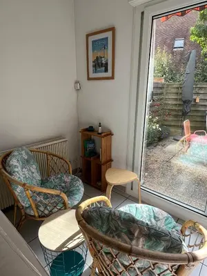 Coin salon dans l'établissement Maison calme avec terrasse - Calypso