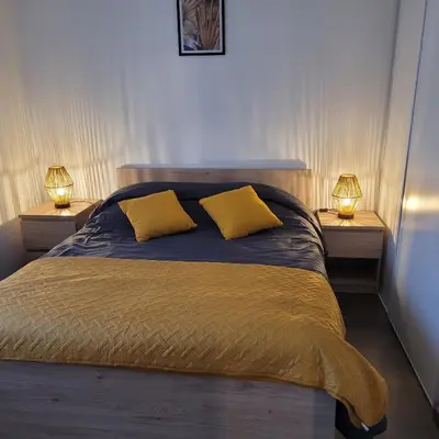 Un ou plusieurs lits dans un hébergement de l'établissement Appartement Port-Mer près des plages