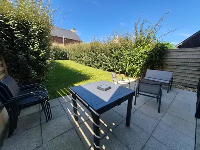 Jardin de l'établissement Appartement Port-Mer près des plages