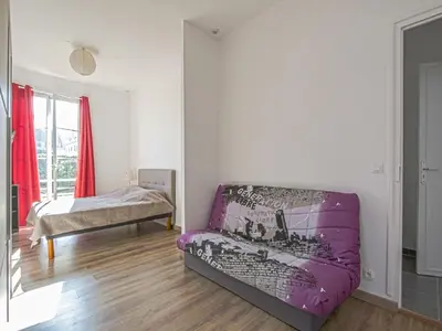 Un ou plusieurs lits dans un hébergement de l'établissement Spacious holiday home in Aure sur Mer with garden