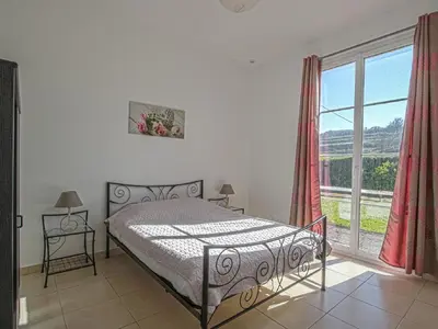 Un ou plusieurs lits dans un hébergement de l'établissement Charming Coastal Hideaway
