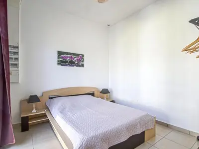 Un ou plusieurs lits dans un hébergement de l'établissement Charming Coastal Hideaway