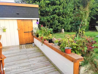 Jardin de l'établissement Gîte Les Hirondelles - Bord de mer et campagne