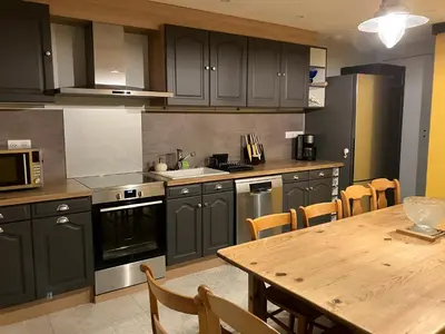 Cuisine ou kitchenette dans l'établissement LA VELOGIROUETTE