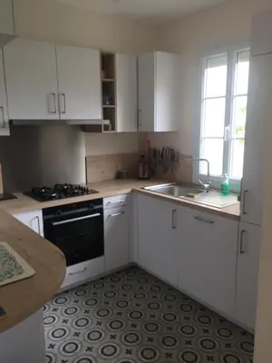 Cuisine ou kitchenette dans l'établissement Luc sur mer