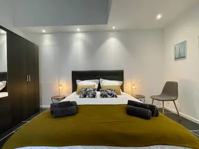 Un ou plusieurs lits dans un hébergement de l'établissement Le logis BAYA - WEEKEND & HOLIDAY - WIFI & TV