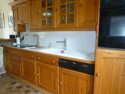 Cuisine ou kitchenette dans l'établissement Papenoo Maison 3 piéces à 600m de la plage
