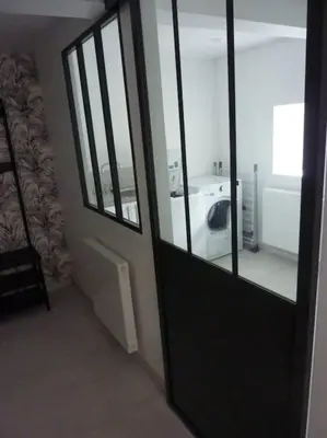 Un ou plusieurs lits dans un hébergement de l'établissement Maison rénovée dans le bocage Normand avec jacuzzi