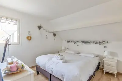 Un ou plusieurs lits dans un hébergement de l'établissement Duplex Cristofina - Welkeys