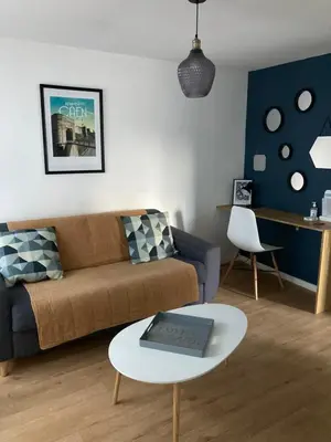 Coin salon dans l'établissement CAEN : appartement Cosy hyper centre historique