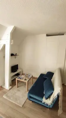 Coin salon dans l'établissement Studio Ouistreham entre centre-ville et plages