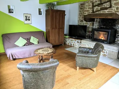 Télévision ou salle de divertissement dans l'établissement La petite corbière - Chez Hélène - Gîtes en baie