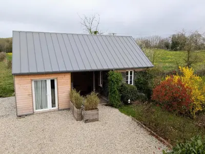 Jardin de l'établissement La petite enseigne - Chez Hélène - Gîtes en baie
