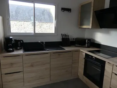 Cuisine ou kitchenette dans l'établissement Le 25 A