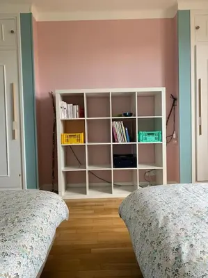 Un ou plusieurs lits dans un hébergement de l'établissement Appart 90m2 lumineux, centre, vue église penchée