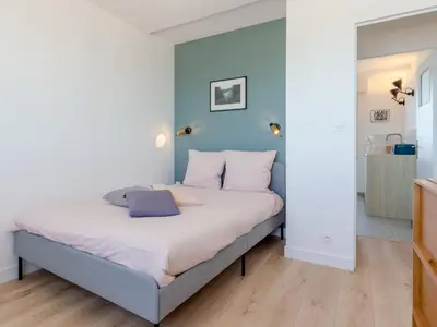 Un ou plusieurs lits dans un hébergement de l'établissement Apartment Les Mouettes by Interhome