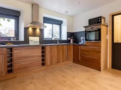 Cuisine ou kitchenette dans l'établissement Holiday Home La Longére by Interhome
