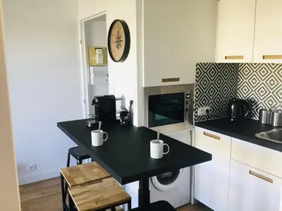 Cuisine ou kitchenette dans l'établissement Cabourg-La mer à vos pieds et la thalasso à 50 m