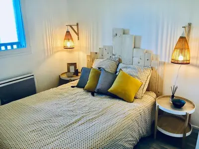 Un ou plusieurs lits dans un hébergement de l'établissement Cabourg T2 tout neuf Accès direct mer Grand balcon
