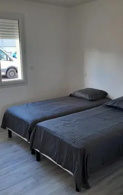 Un ou plusieurs lits dans un hébergement de l'établissement Maison neuve proche de la mer