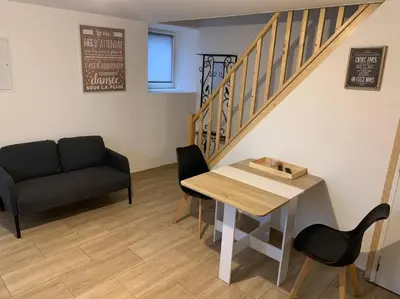 Coin salon dans l'établissement Le Nalousie